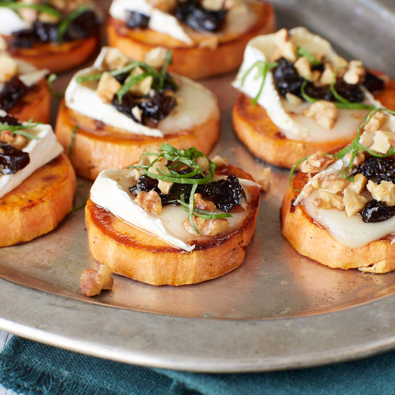 Use sweet potato slices instead of bread for a gluten-free crostini topped with brie and Sunsweet prunes that everyone will love.