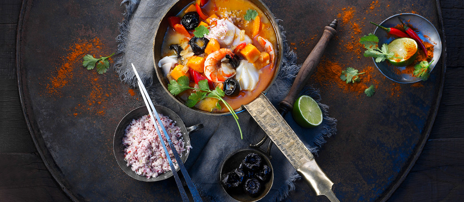 Full of color and flavor, this Southeast Asian fish curry is an unexpected twist on a classic curry. Tamarind is a typical seasoning ingredient in fish curries because it delivers bright flavor. While sweeter, the tanginess of prunes can achieve a similar effect. For a variation, try soaking prunes in lime juice before adding them to the curry.