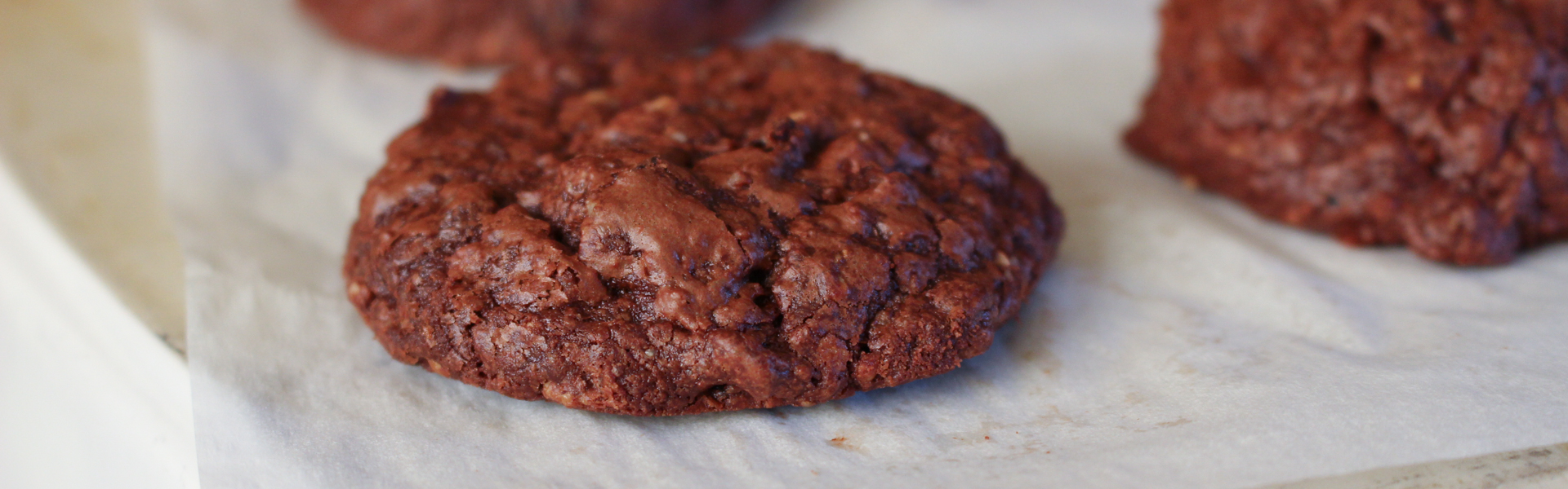 Ground walnuts and hazelnuts mixed with eggs take the place of flour in these decadent gluten-free chocolate nut cookies with prunes.