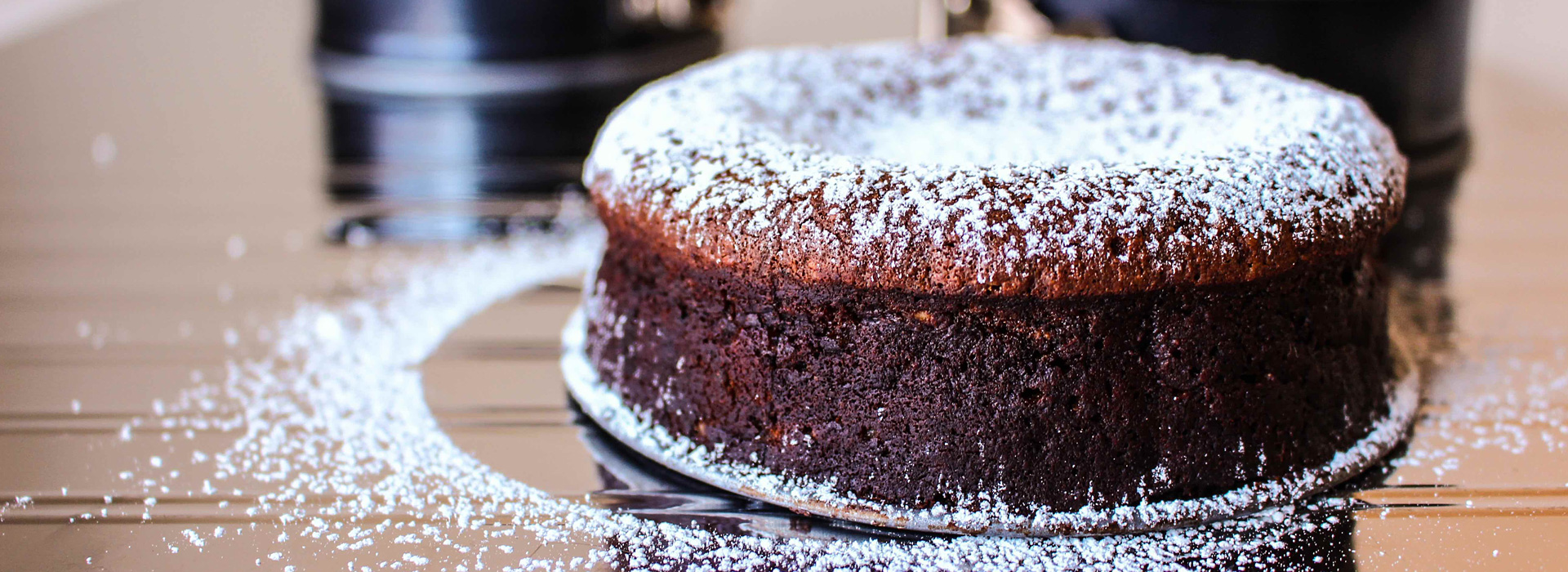 This rich cake leverages a classic dessert pairing: chocolate and hazelnuts,. Here, prune puree deepens the chocolate's decadence.